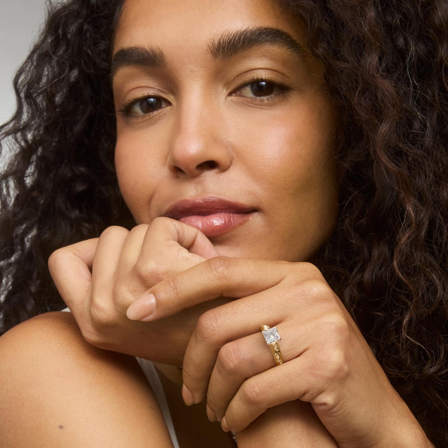 Asscher Cut Diamond Solitaire Ring in Yellow Gold with Hand Engraved Vintage Band