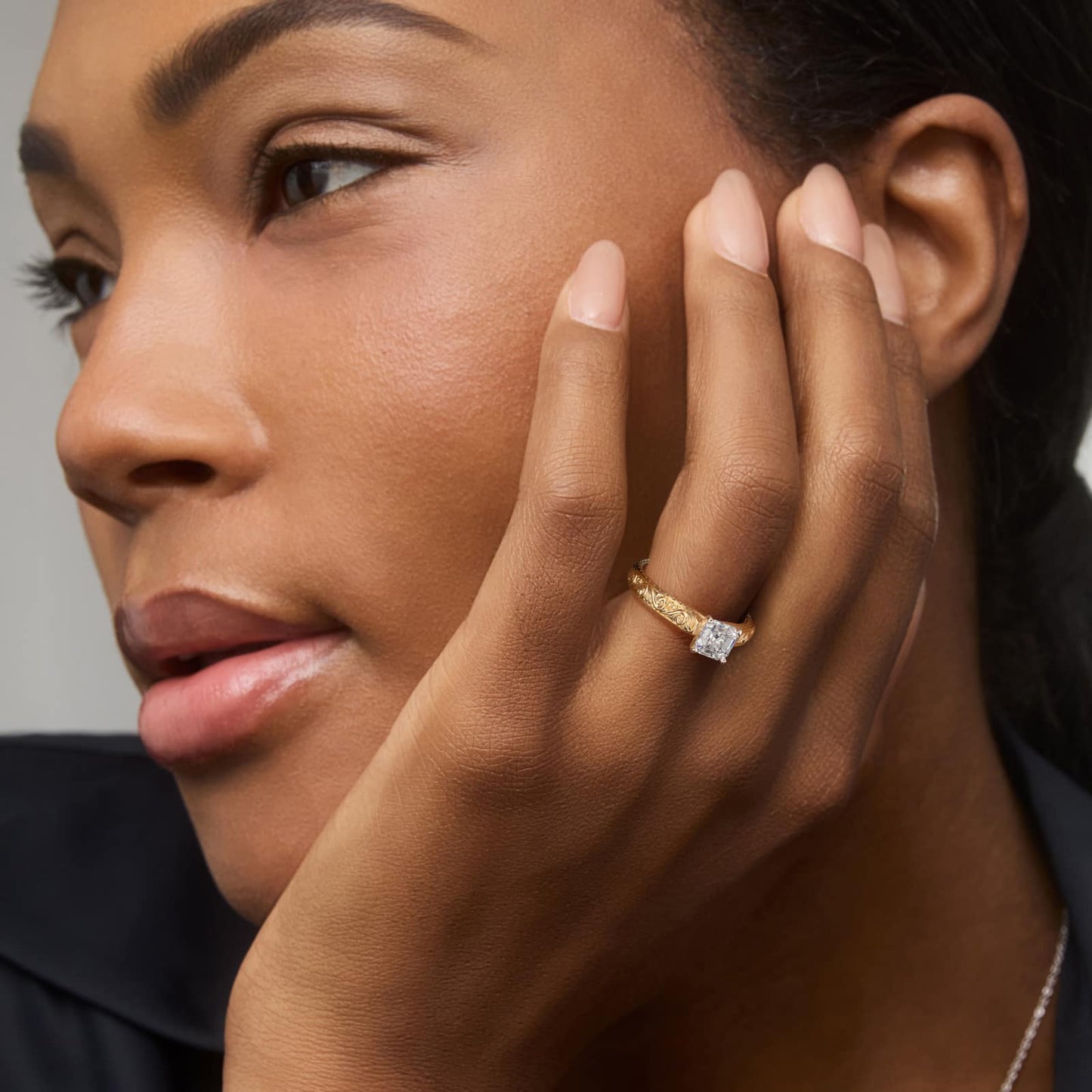 Asscher Cut Diamond Solitaire Ring in Yellow Gold with Hand Engraved Vintage Band